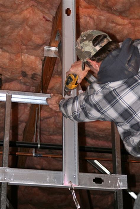 how to attach electrical boxes to a steel beam|attaching boxes to electrical beams.